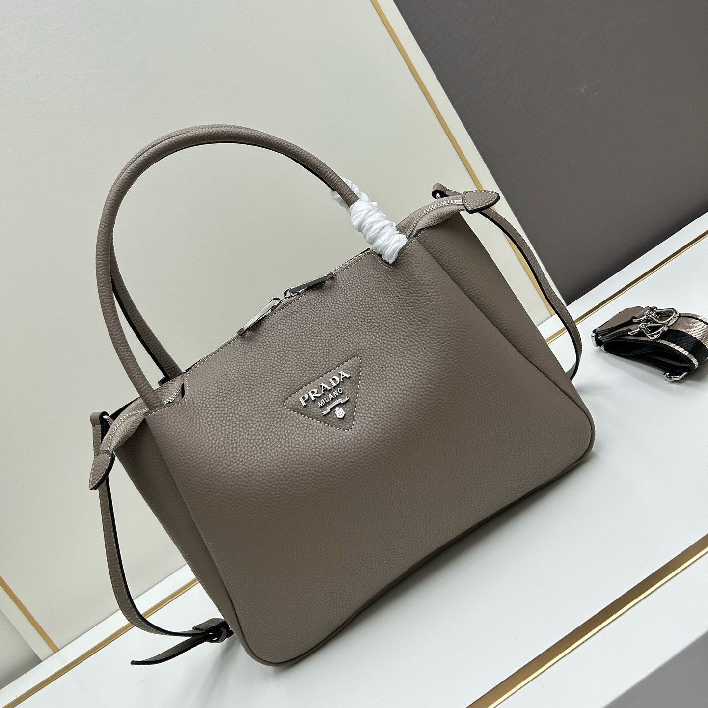 Pra*a top handle bags